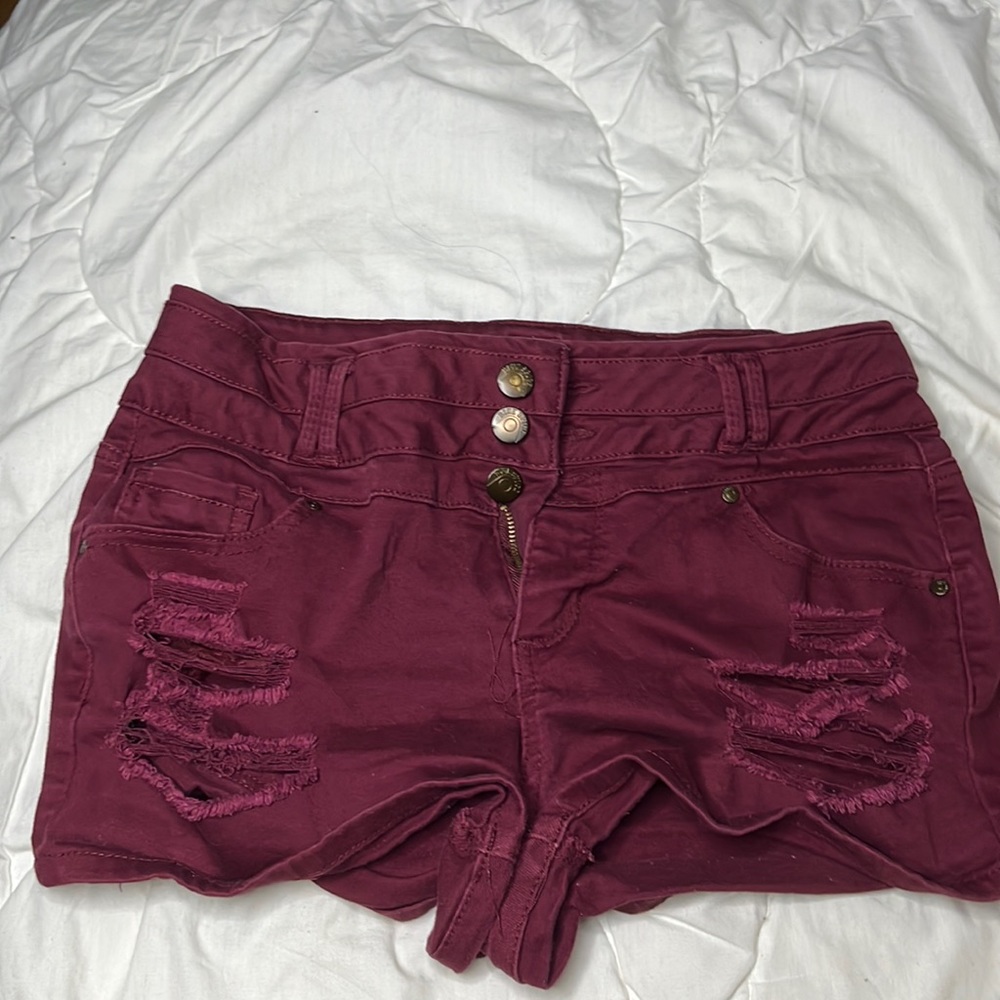 Maroon distressed jean shorts. Size 7/8. Like new, worn a couple times.